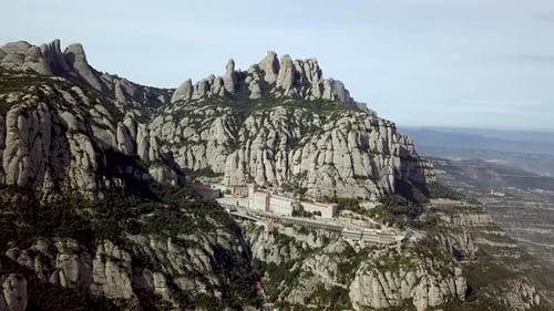 Aerial Montserrat Mountain Range With Santa Maria Abbey Monastery In Spain