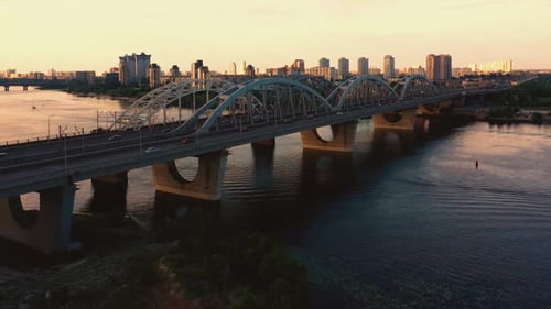 Aerial View of Urban Scape with Long Bridge Above the River