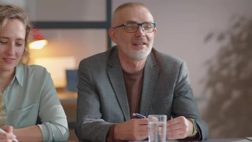 Professionals Meet at Modern Office Building