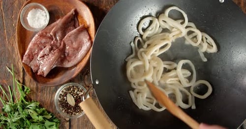 Cooking Squid Rings in Wok