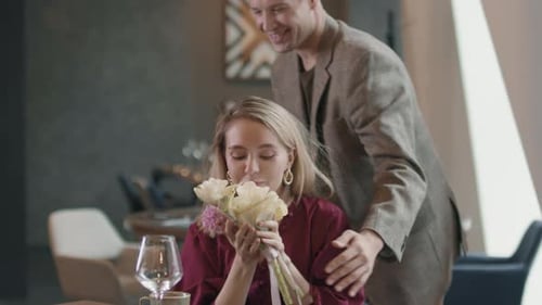 Young Couple On Date In Restaurant