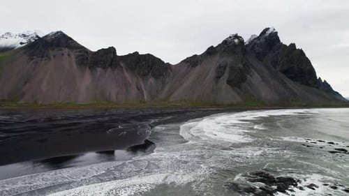 Drone Over Black Sand Beach Sea And Vestrahorn Mountain