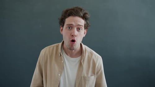Angry Man Yelling and Pointing Aggressively
