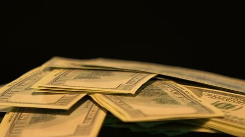 Falling Dollar Banknotes Isolated on Black Background, Bank Robbery, Crime