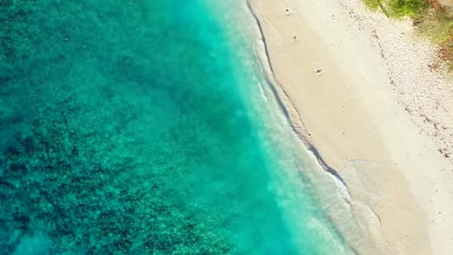 Aerial drone view seascape of idyllic coast beach journey by blue ocean with white sand background o