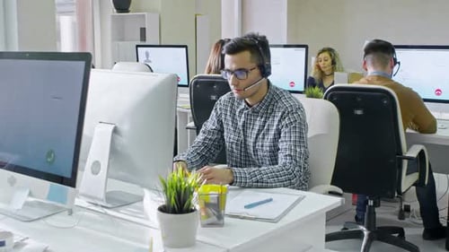 Helpdesk Operators Working in Office