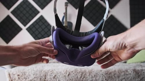 POV of Putting on VR Glasses Virtual Reality in the Living Room