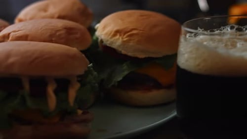 Delicious Burgers With A Foamy Drink on Table