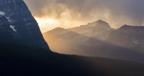 Light Beams Shining Through Mountain Pass