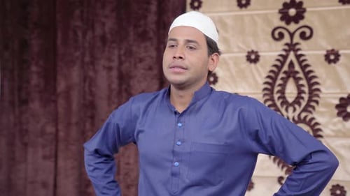 Relaxed Muslim man