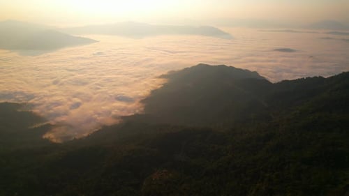 Flying over the clouds during morning sunrise. wonderful morning sunrise natural Landscape.