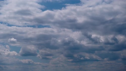 Cumulus Clouds Move in the Blue Sky Cloudscape Timelapse