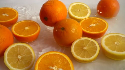 Citrus Fruits Splash with Oranges and Lemons