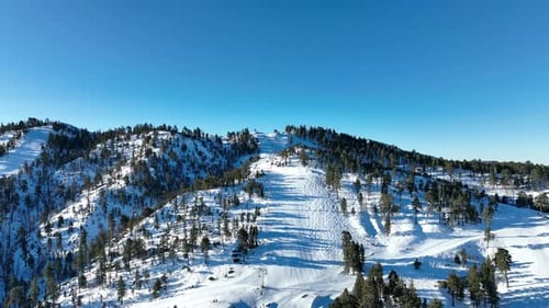 Aerial View of Mountain Ski Resort with Beautiful Winter Landscape