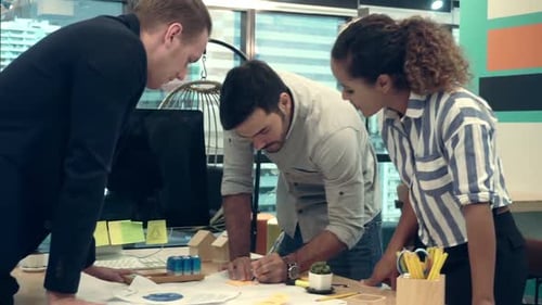 Creative Business People Group Having Conversation at Office Desk in Workplace