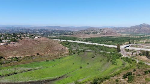 Aerial View of Rancho Bernardo Mountain with Freeway Road on the Background. San Diego. California