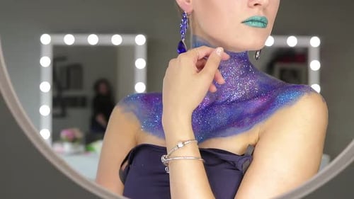 Model with Glitter Body Paint Posing in Studio