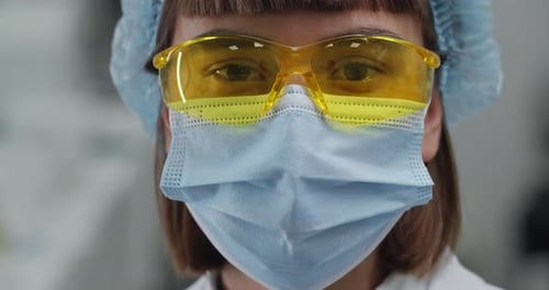 Medical Professional Wearing Face Mask and Goggles