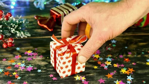 Christmas Gift Placed on Festive Holiday Table