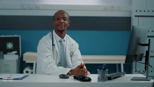 Doctor at Desk in Bright Modern Office