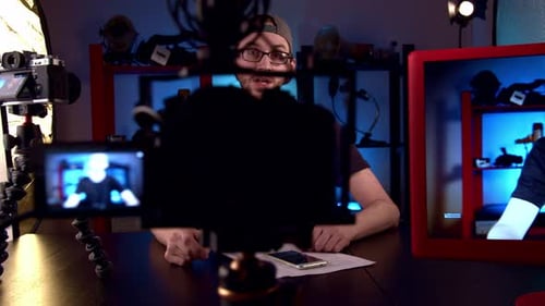 Man explaining subject for camera recording vlog