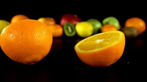 Sliced Orange Falling in Slow Motion