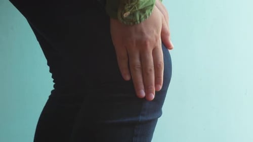 Massaging Knee Close Up