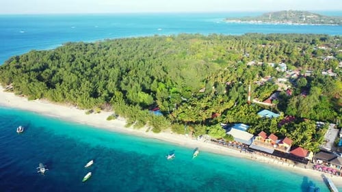 Tropical overhead abstract shot of a white sandy paradise beach and aqua turquoise water background