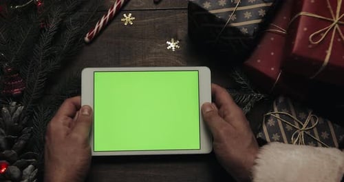 Hands Santa Claus Holding White Tablet Computer Green Screen