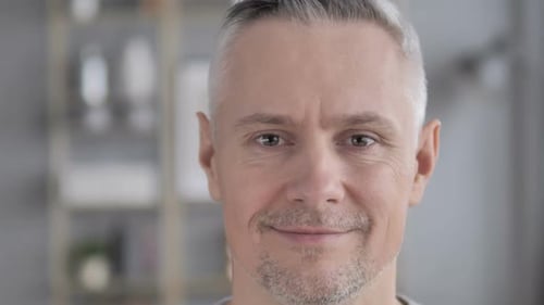 Yes Face Close Up of Gray Hair Man Shaking Head to Accept Offer
