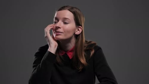 Young Girl Thinking of Something Unpleasant