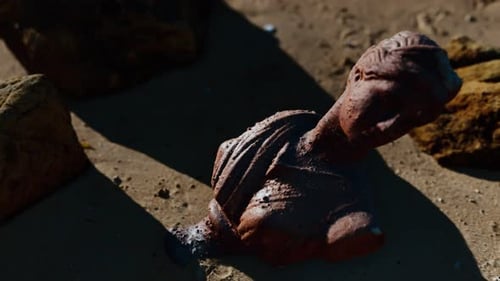 Ancient Woman Bust at Sand Beach