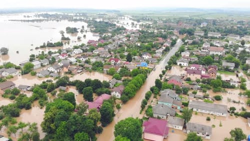 Aerial View From Above on the Flooded Houses and the City. Flood After Floods From the Mountains