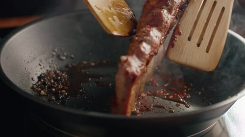 Chef Frying Ribs Closeup