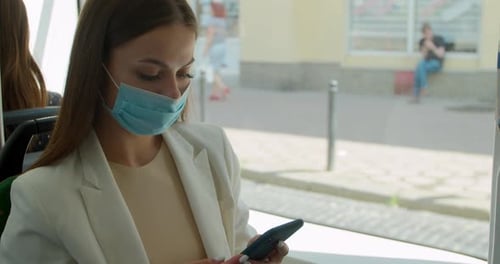 Coronavirus Pandemic Is Over, Quarantine End, Young Woman in Protective Medical Face Mask in a