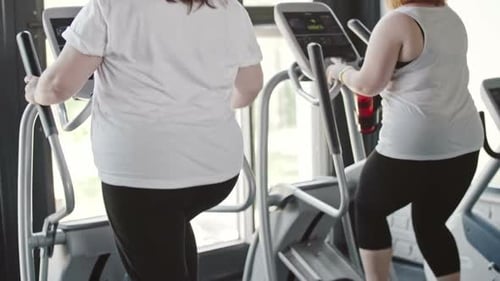 Working Out on Elliptical Trainer
