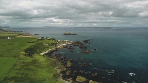 Rocky Shore Aerial View Green Grass Meadows and Fields