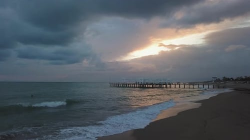 Beautiful Sunset at Beach with Golden Sun Reflection on the Sea