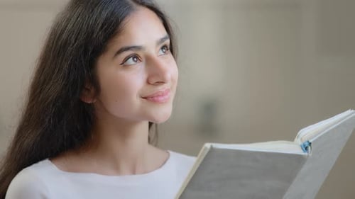 Dreamy Girl Student Relaxed Arab Intelligent Woman Reading Paper Book Classic Romantic Literature