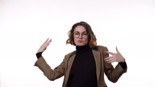 Woman Dancing in Brown Jacket and Glasses