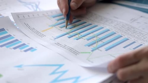 Analysis of business charts in the office
