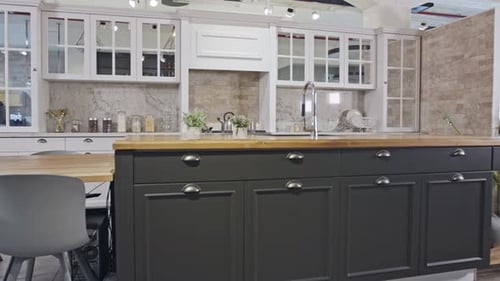 Tracking shot of a luxury kitchen with gray and white classic design