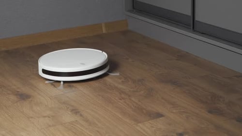 Robot Vacuum Cleaner Cleaning Hardwood Floor