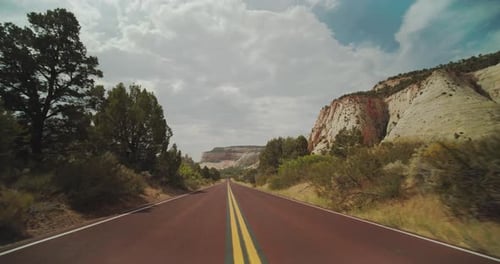 Scenic Desert Drive with Majestic Rock Formations