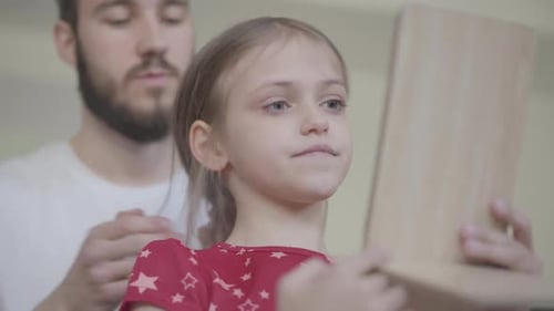 Dad Puts Crown on Daughter's Head