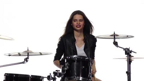 Enthusiastic Woman Playing Drums on White Background
