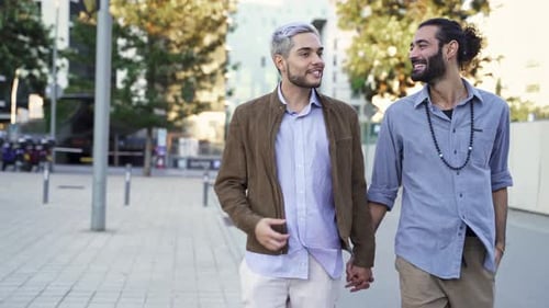 Latin Hispanic Gay Couple Walking in the City Streets on Date