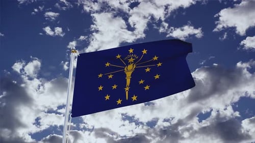 Indiana State Flag Waving Against Blue Sky
