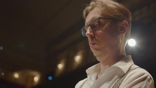 Pianist Performing Classical Music at Concert