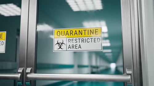 A restricted area while an epidemic.Warning sign on the glass door. Quarantine.